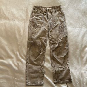 The Wanderer Pilcro pants in beige.